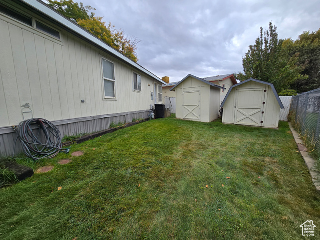 1025 North 300 West, Unit 1 Springville, UT 84663 - Photo 26 of 35 View of yard featuring a storage shed