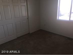 22735 West Patton Road Wittmann, AZ 85361 - Photo 20 of 35 Bedroom 3