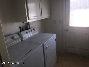 22735 West Patton Road Wittmann, AZ 85361 - Photo 22 of 35 Indoor Laundry room