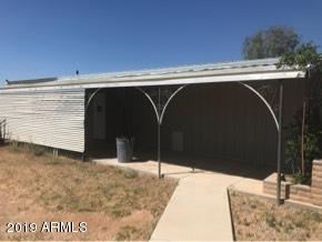 22735 West Patton Road Wittmann, AZ 85361 - Photo 4 of 35 Covered patio on garage