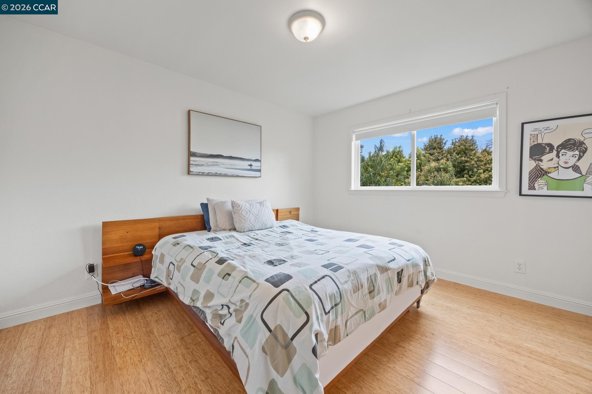 2327 Tenth Street, Unit 4 Berkeley, CA 94710 - Photo 21 of 39 a bedroom with bed and a window