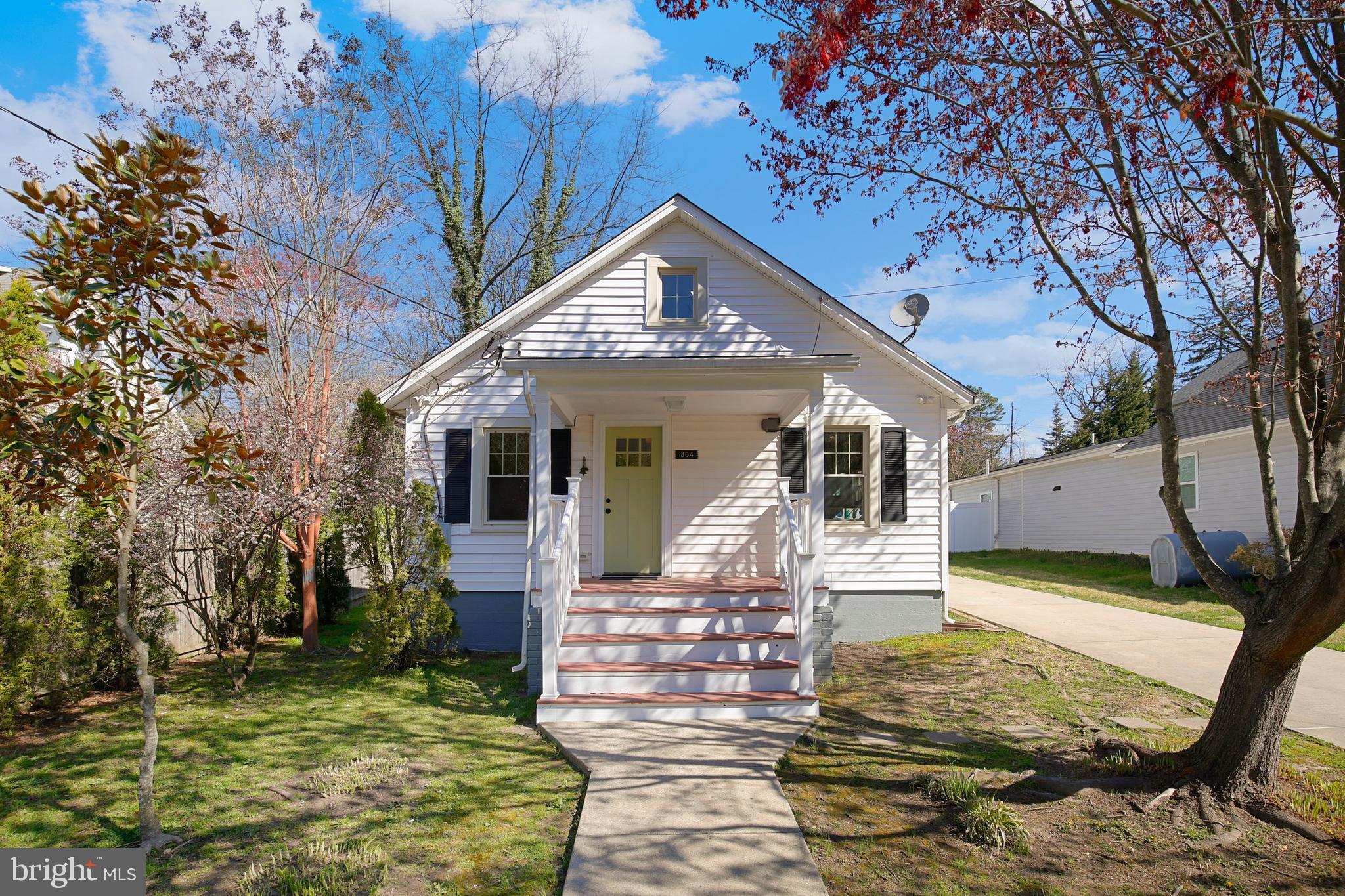 304 Marshall Street Gaithersburg, MD 20877 - Photo 1 of 38 a view of a house with backyard porch and sitting area