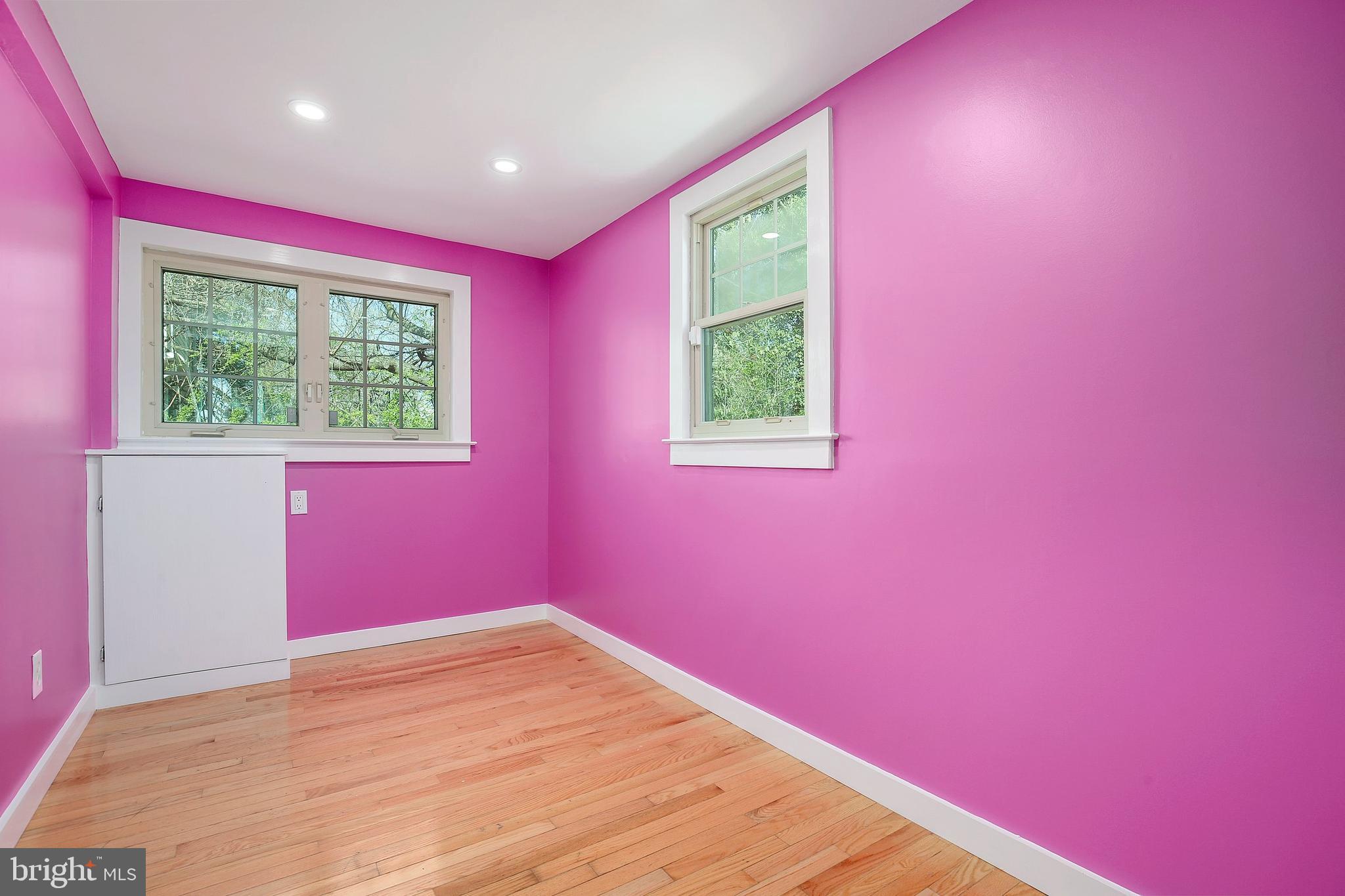 304 Marshall Street Gaithersburg, MD 20877 - Photo 21 of 38 a view of a big room with wooden floor and windows