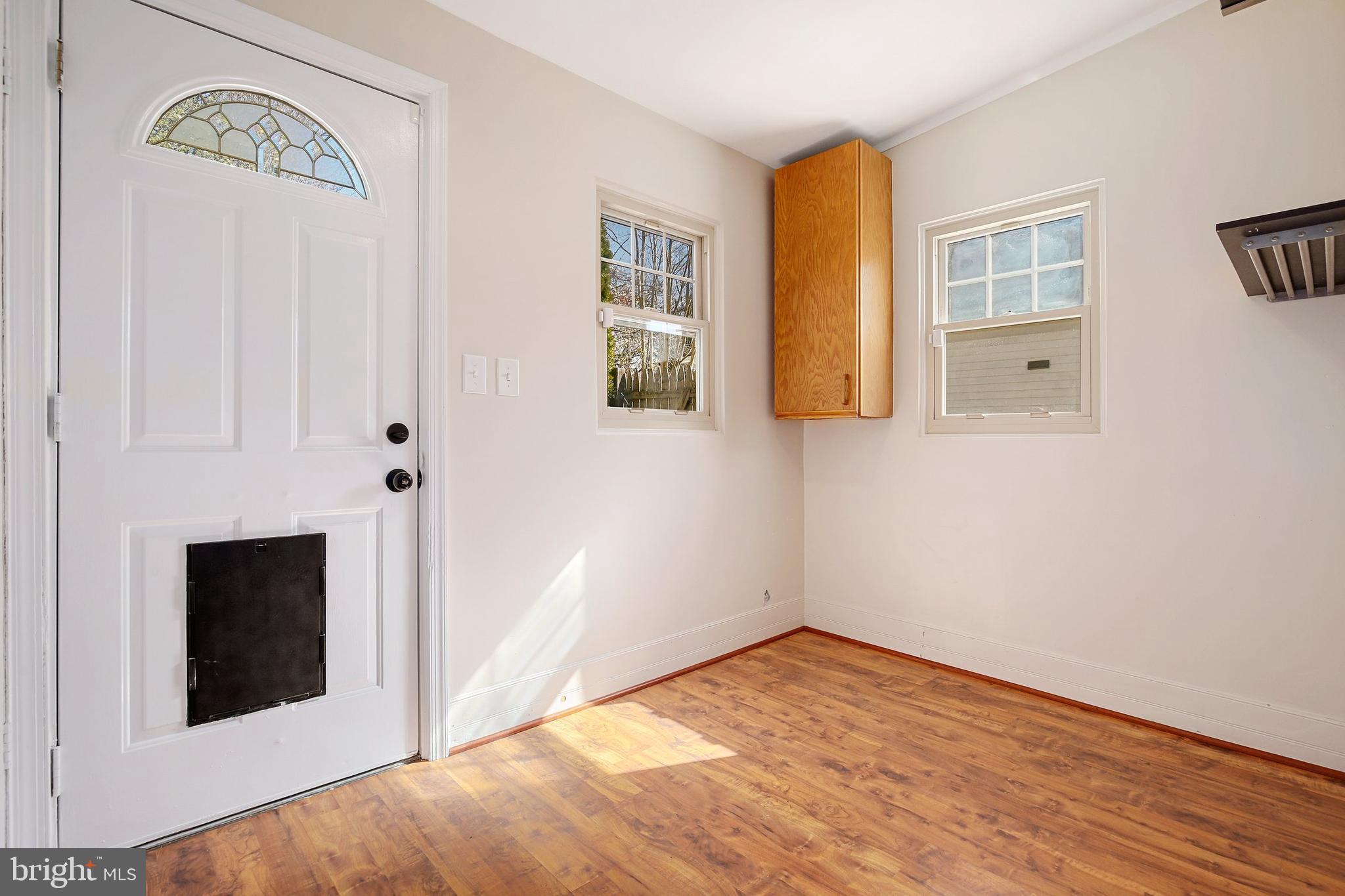 304 Marshall Street Gaithersburg, MD 20877 - Photo 22 of 38 a view of empty room with window and fireplace