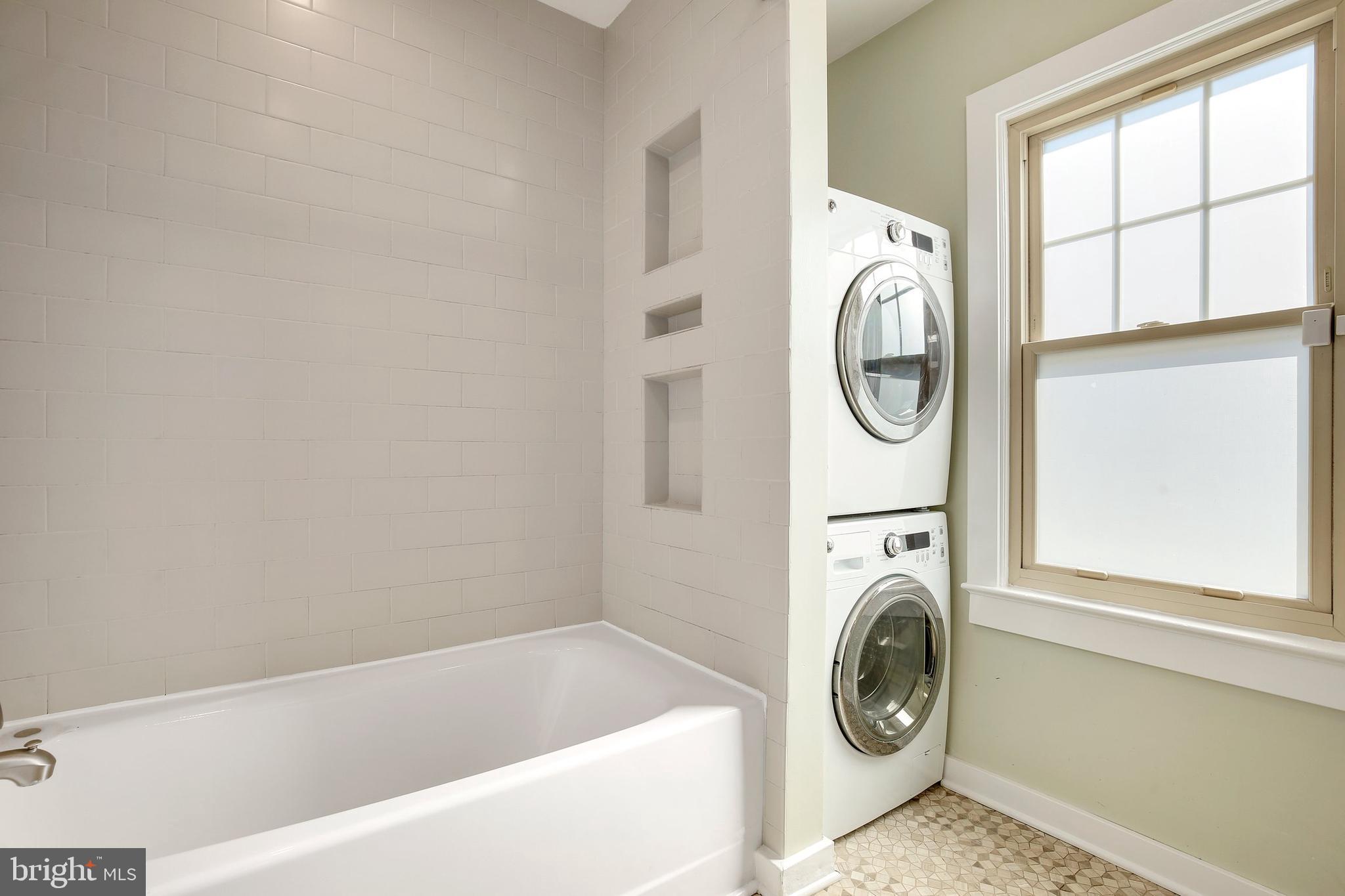 304 Marshall Street Gaithersburg, MD 20877 - Photo 25 of 38 a view of washer and dryer in a utility room