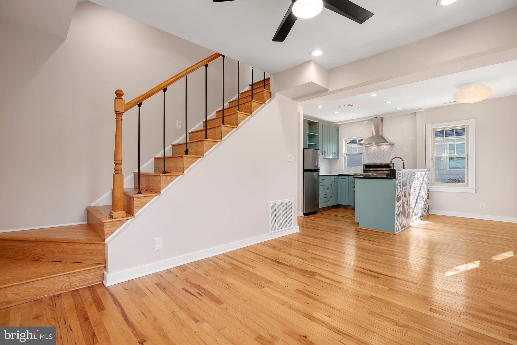 304 Marshall Street Gaithersburg, MD 20877 - Photo 26 of 38 a view of kitchen and hall with wooden floor