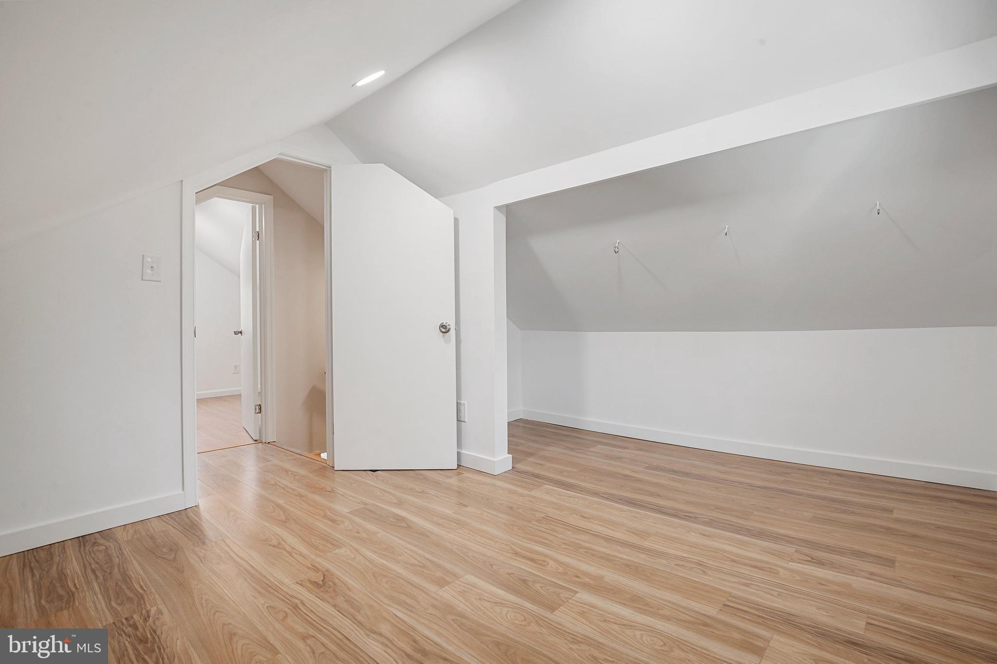 304 Marshall Street Gaithersburg, MD 20877 - Photo 28 of 38 a view of an empty room with wooden floor