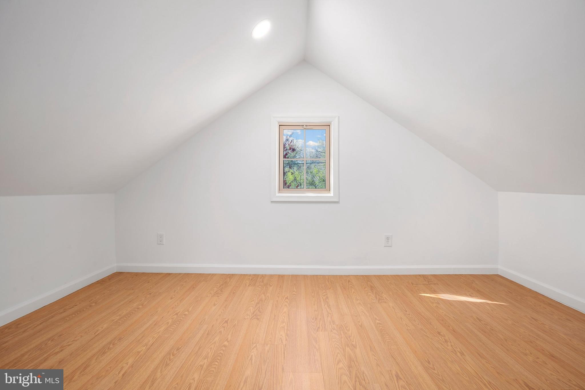 304 Marshall Street Gaithersburg, MD 20877 - Photo 29 of 38 an empty room with wooden floor and windows