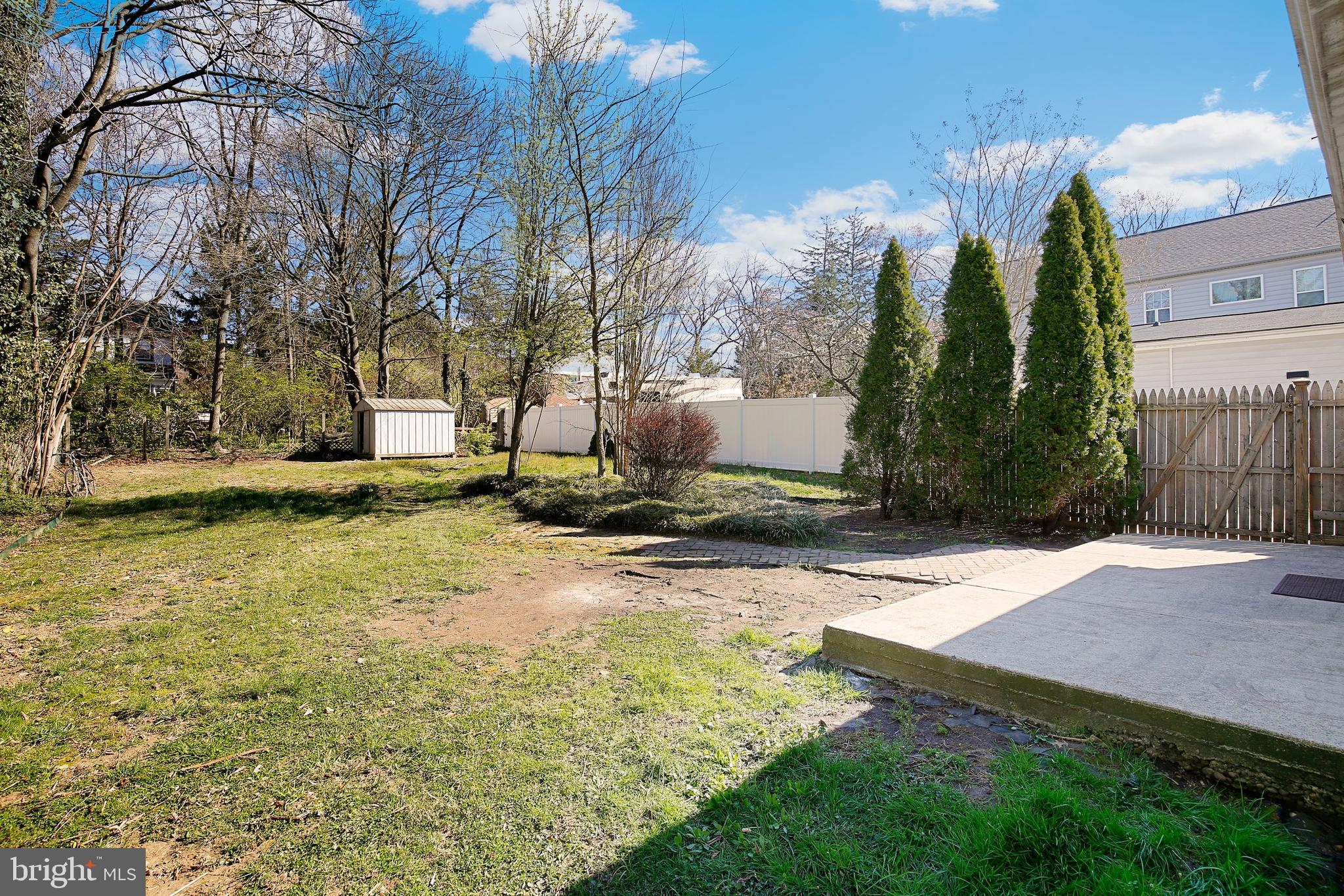 304 Marshall Street Gaithersburg, MD 20877 - Photo 31 of 38 a view of a garden with a fountain