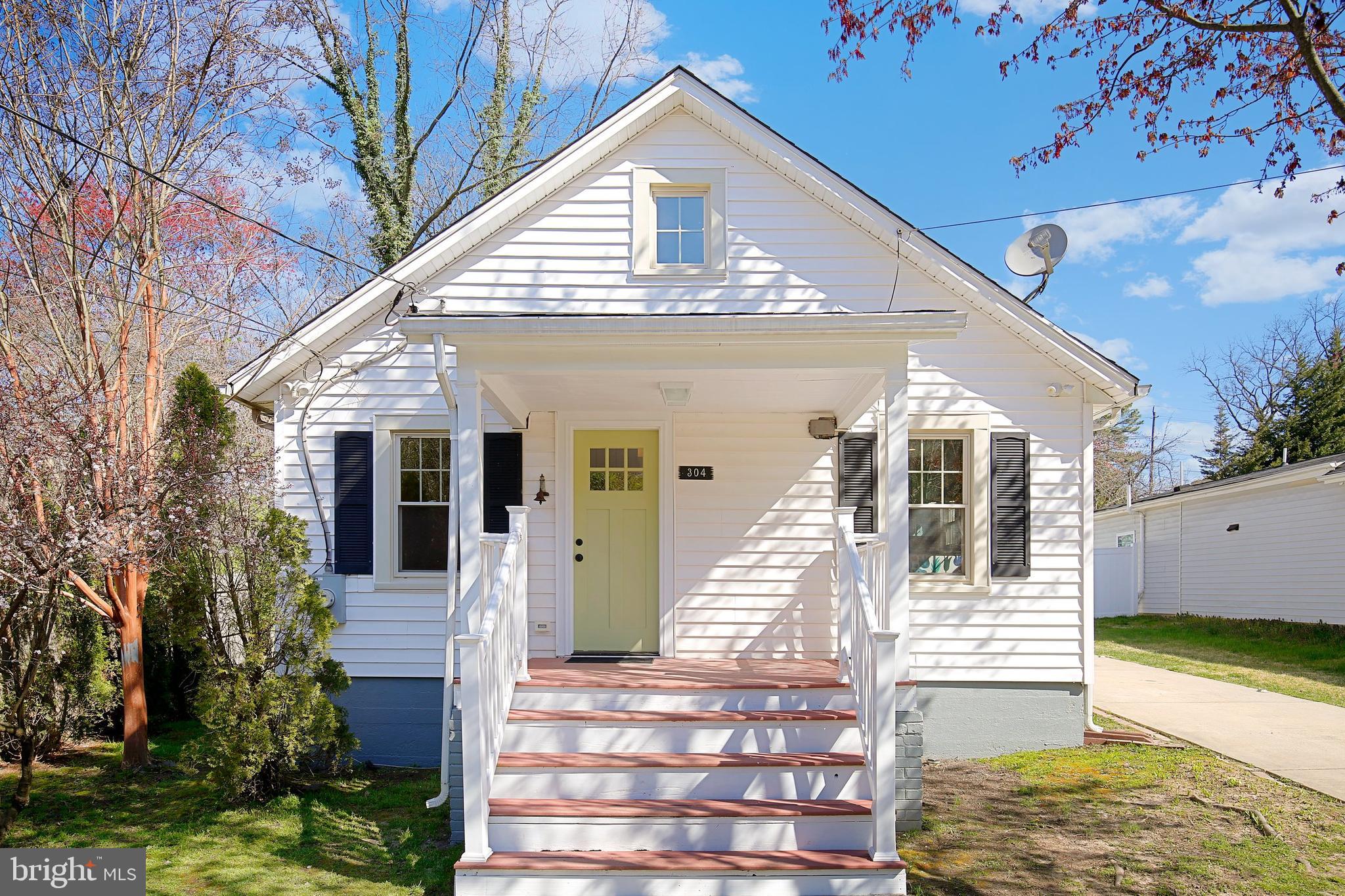 304 Marshall Street Gaithersburg, MD 20877 - Photo 37 of 38 a front view of a house with a yard