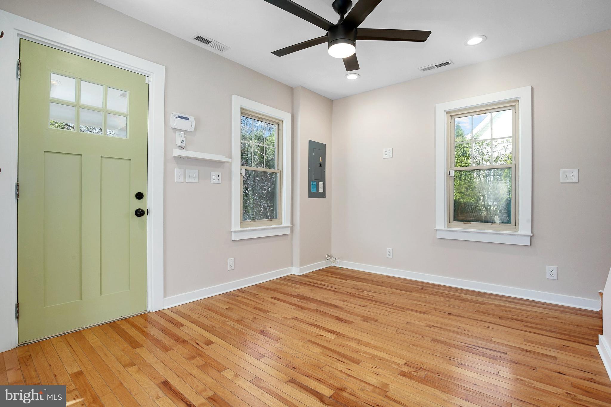 304 Marshall Street Gaithersburg, MD 20877 - Photo 4 of 38 a view of empty room with wooden floor and fan