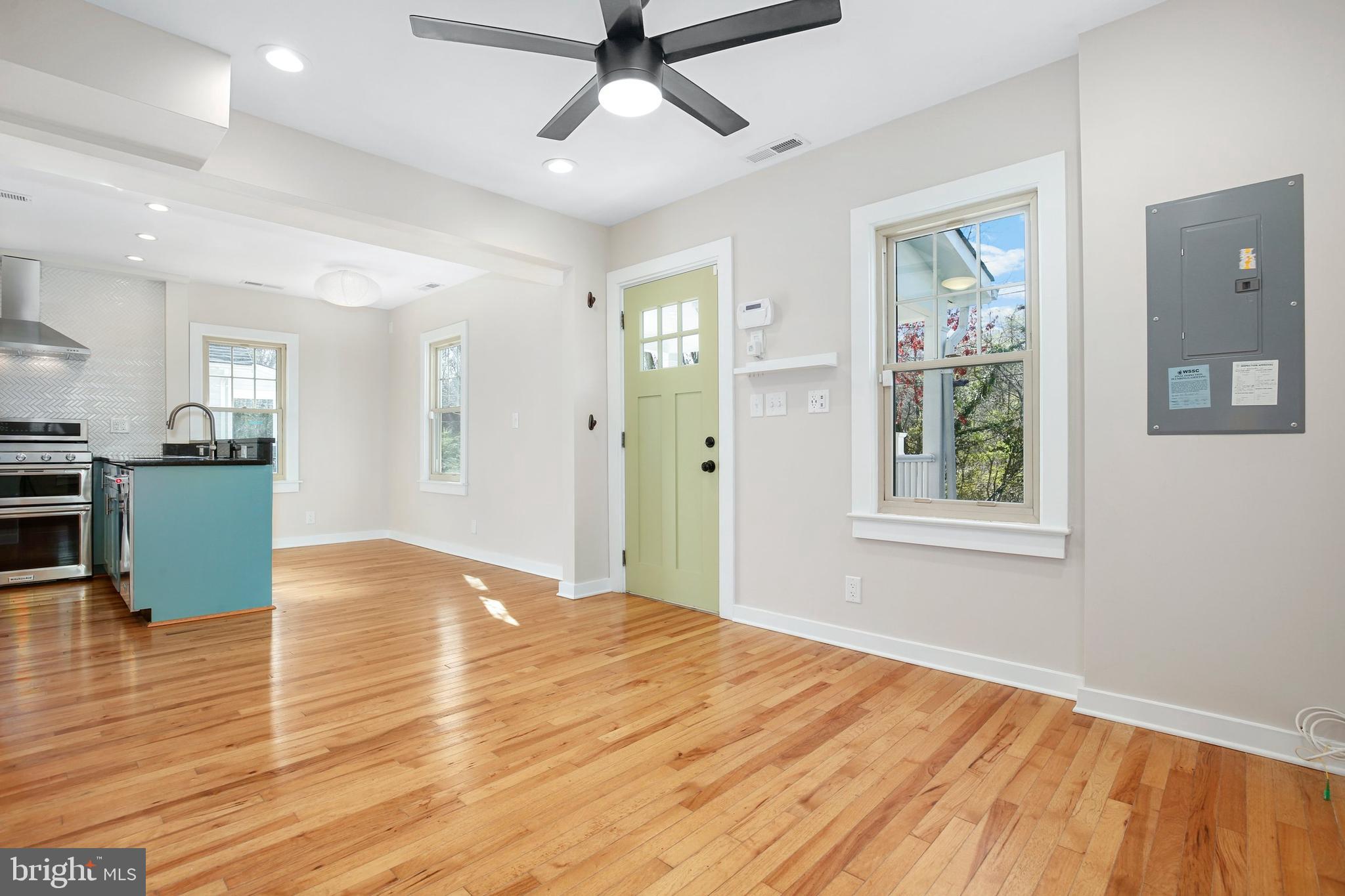 304 Marshall Street Gaithersburg, MD 20877 - Photo 5 of 38 a view of an empty room with window and wooden floor