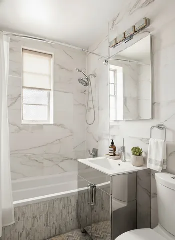 a kitchen with a stove and a sink