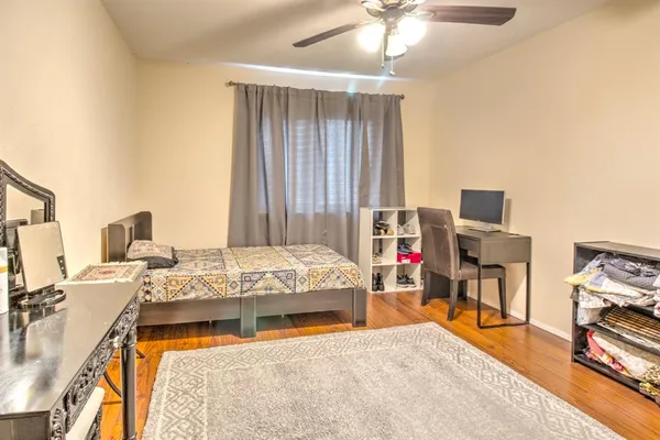 a bed room with a bed and a couch
