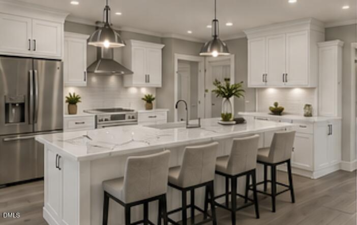 405 Alston Street Raleigh, NC 27601 - Photo 3 of 23 a kitchen with stainless steel appliances kitchen island granite countertop a sink and a refrigerator