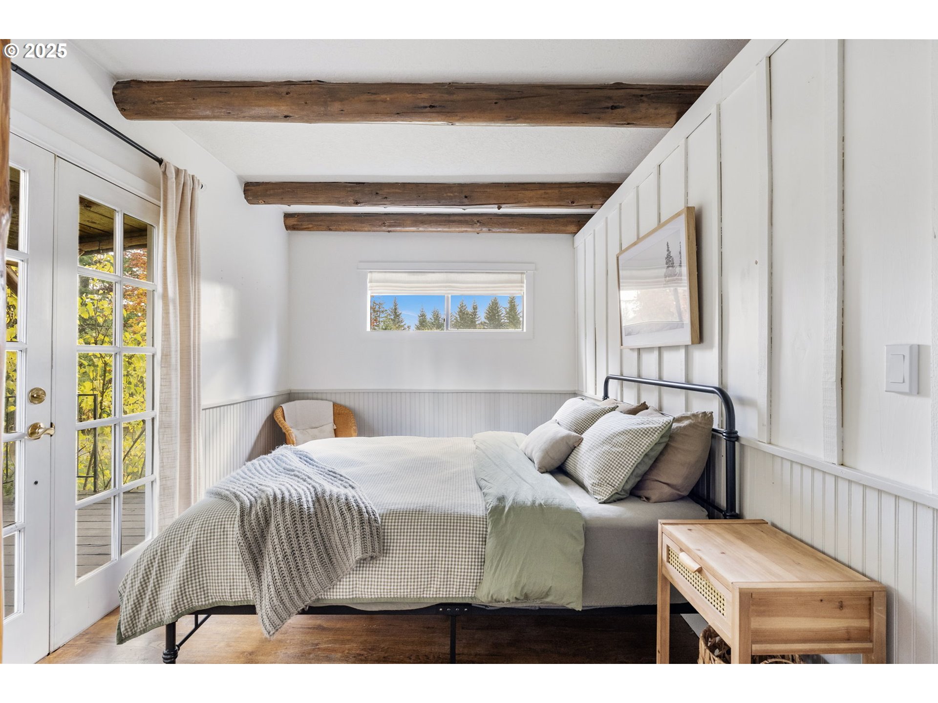 25751 Southeast Brian Ranch Road Sandy, OR 97055 - Photo 15 of 44 a bedroom with a bed and a window