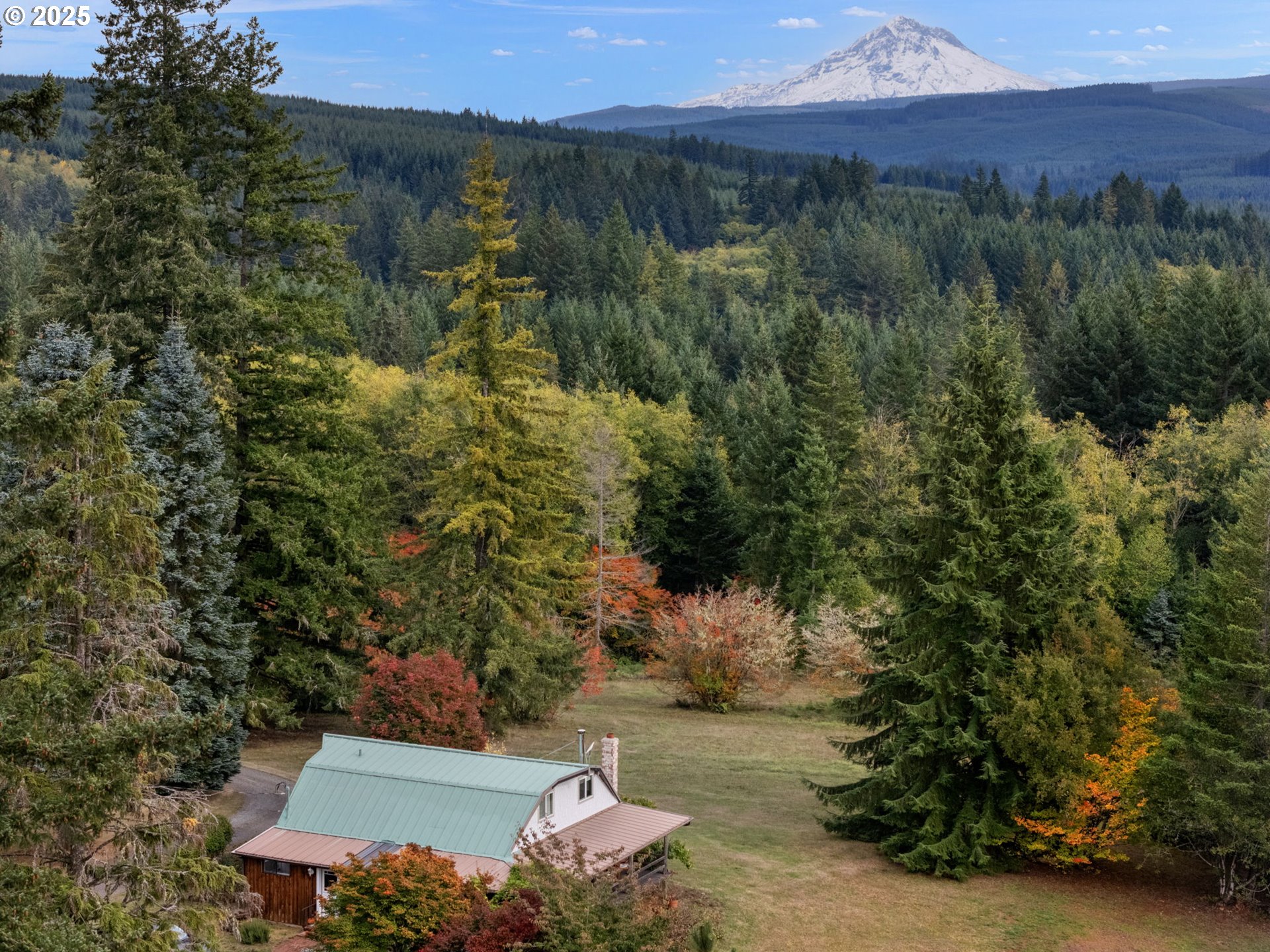 25751 Southeast Brian Ranch Road Sandy, OR 97055 - Photo 2 of 44 an aerial view of a house with a yard