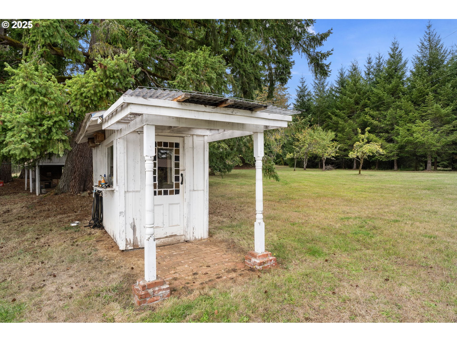 25751 Southeast Brian Ranch Road Sandy, OR 97055 - Photo 29 of 44 a view of a house with a yard