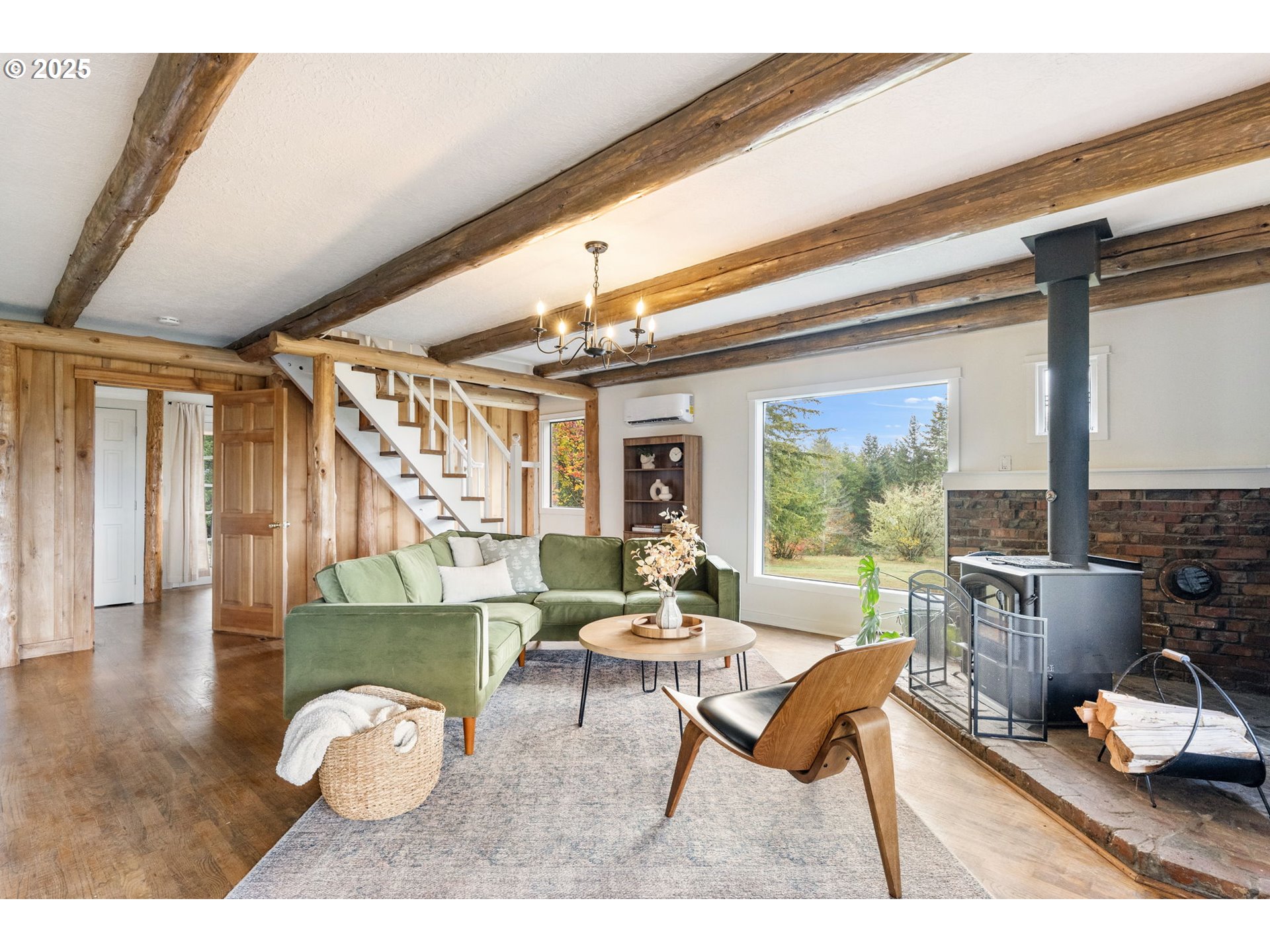25751 Southeast Brian Ranch Road Sandy, OR 97055 - Photo 7 of 44 a living room with furniture and a large window