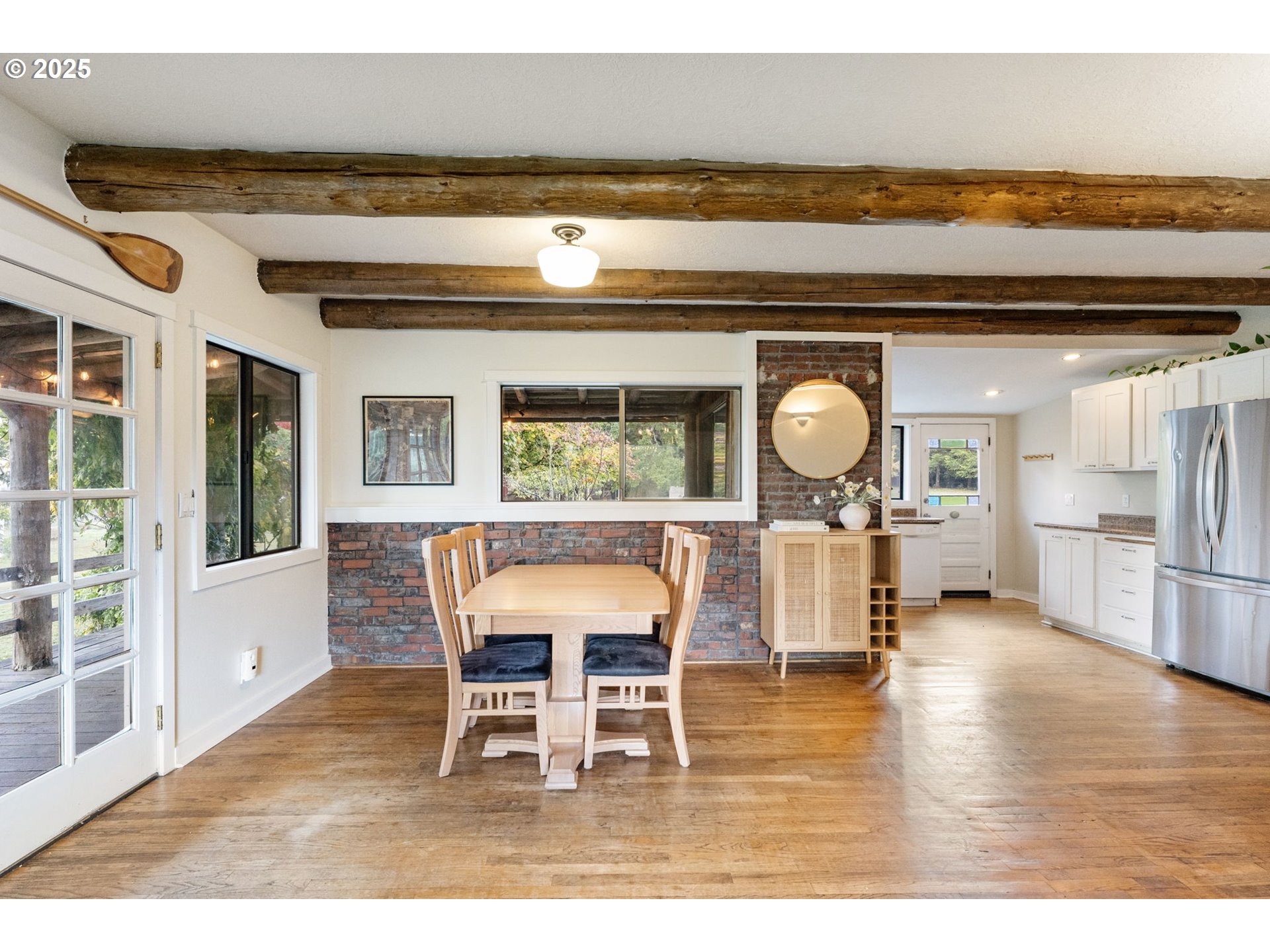 25751 Southeast Brian Ranch Road Sandy, OR 97055 - Photo 10 of 44 a view of a dining room with furniture and wooden floor