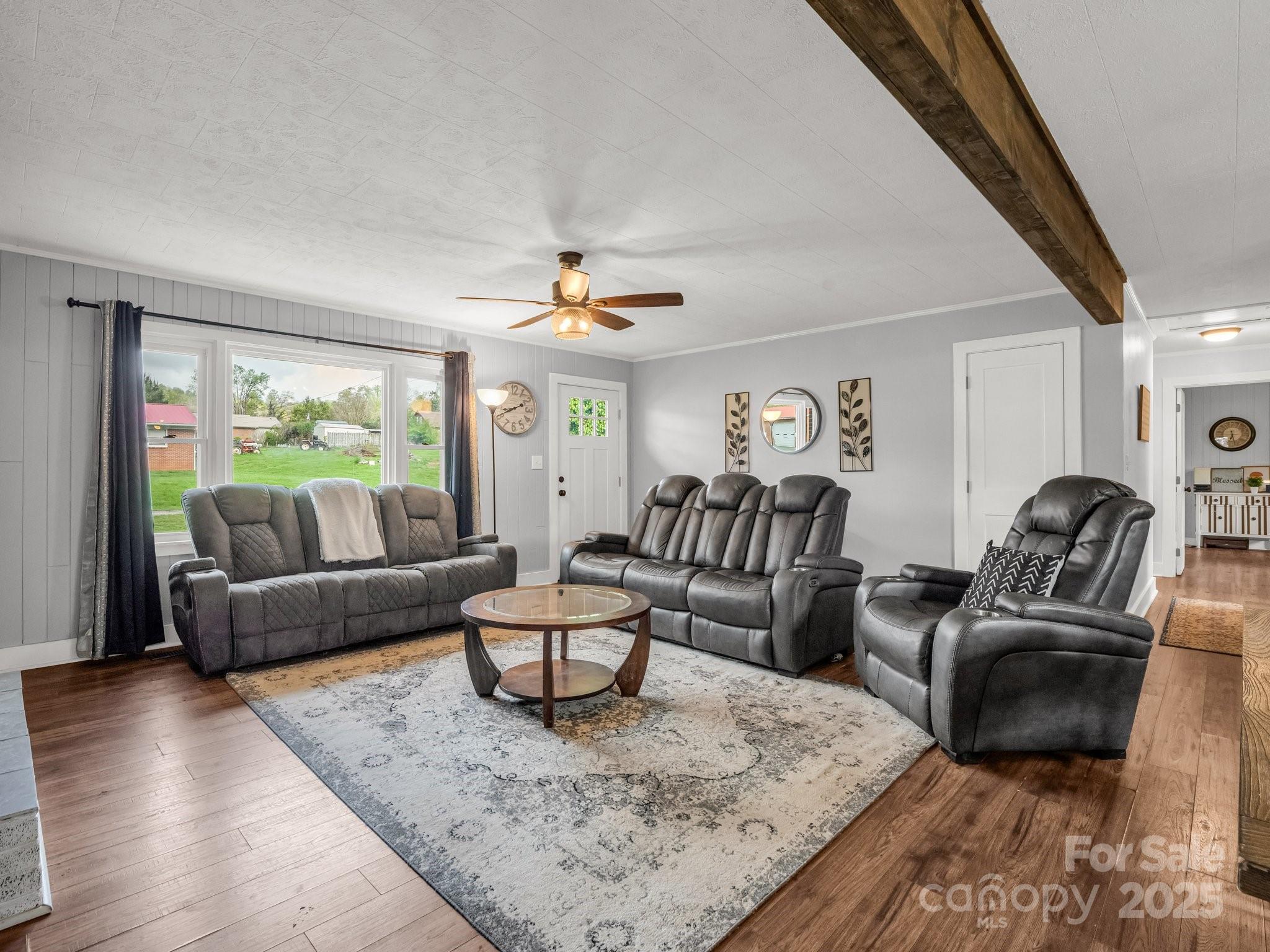 88 North Valley Street Marion, NC 28752 - Photo 5 of 43 a living room with furniture and wooden floor
