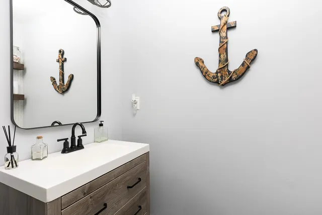 a view of a balcony with table and chairs