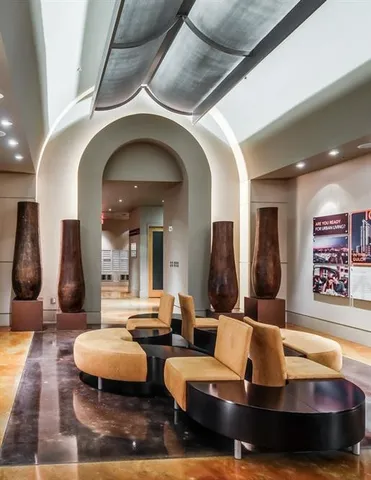 a kitchen with kitchen island a table and chairs