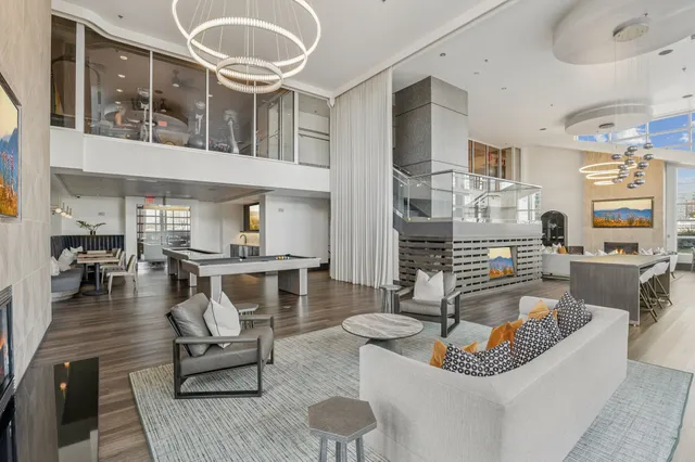 a kitchen with stainless steel appliances granite countertop a stove and a refrigerator