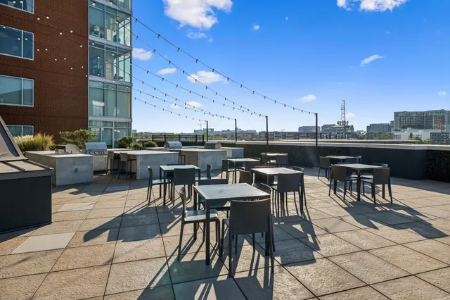 a view of a chairs and table in the patio