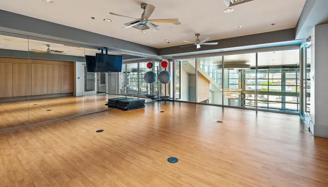 a view of tall buildings with a yard