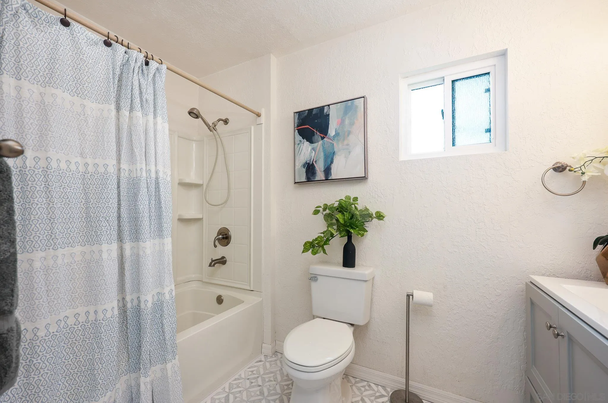 11739 Walnut Road Lakeside, CA 92040 - Photo 17 of 32 a bathroom with a shower a toilet and a shower