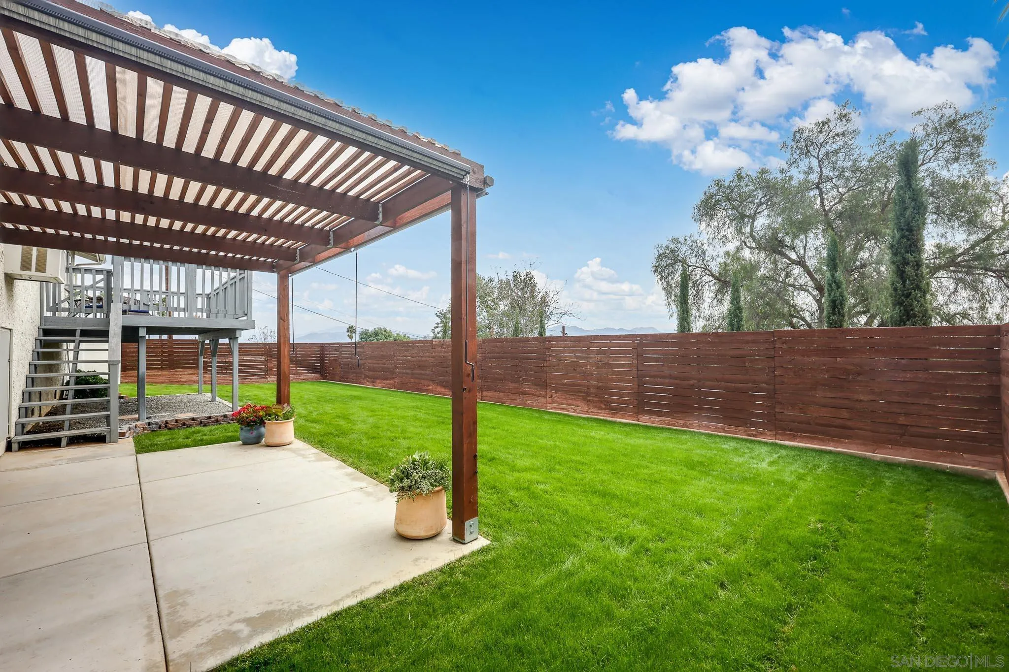 11739 Walnut Road Lakeside, CA 92040 - Photo 26 of 32 a view of a backyard with sitting area