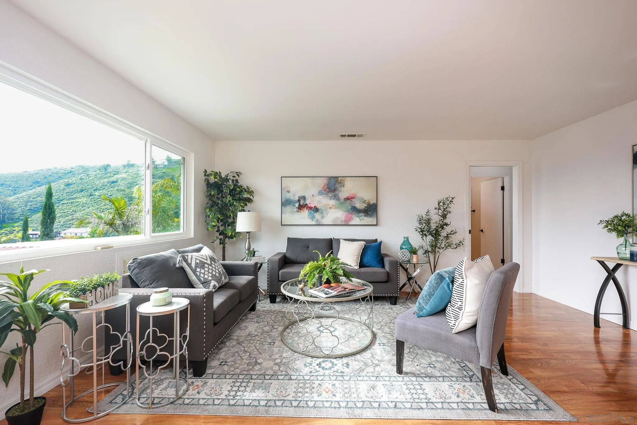 11739 Walnut Road Lakeside, CA 92040 - Photo 6 of 32 a living room with furniture and a large window