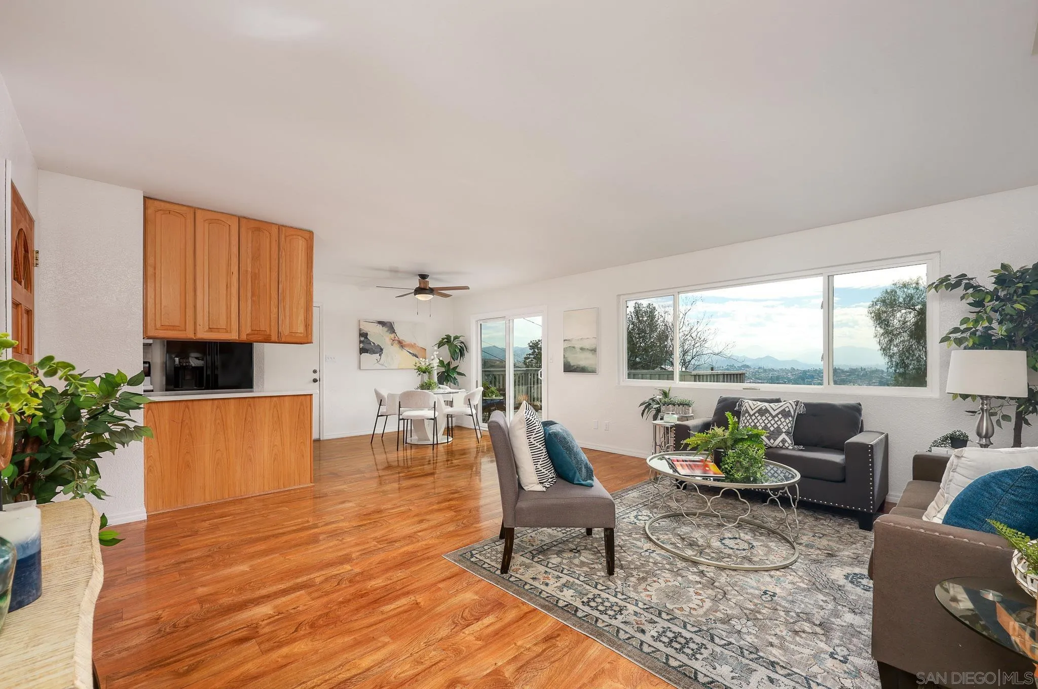 11739 Walnut Road Lakeside, CA 92040 - Photo 7 of 32 a living room with furniture and a large window