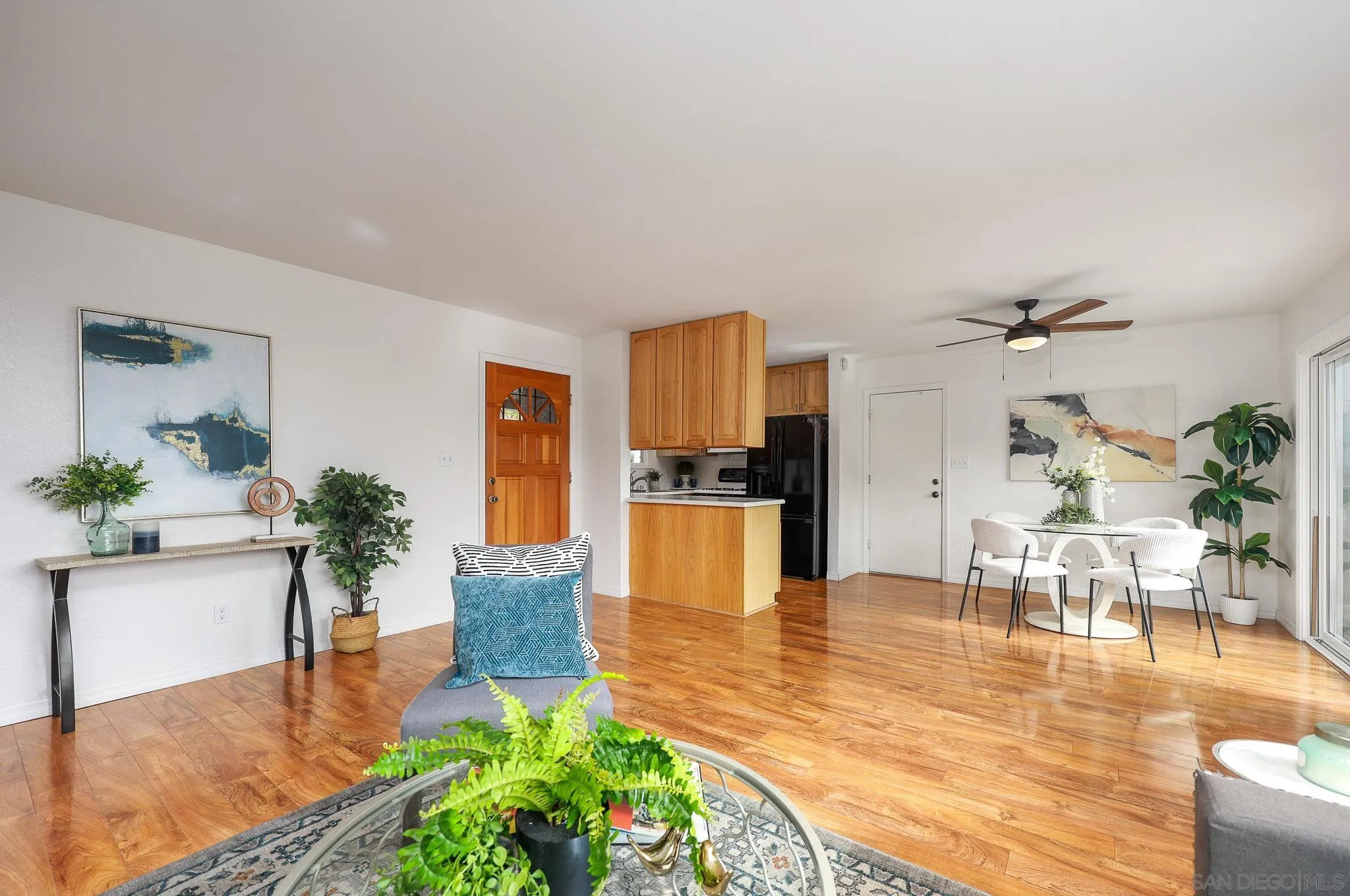 11739 Walnut Road Lakeside, CA 92040 - Photo 8 of 32 a living room with furniture and a kitchen view
