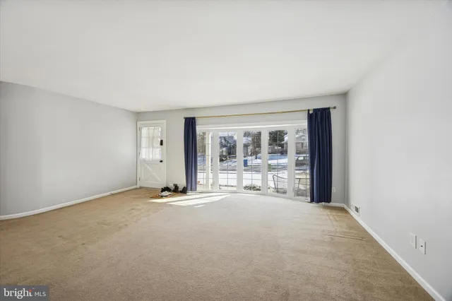 an empty room with window