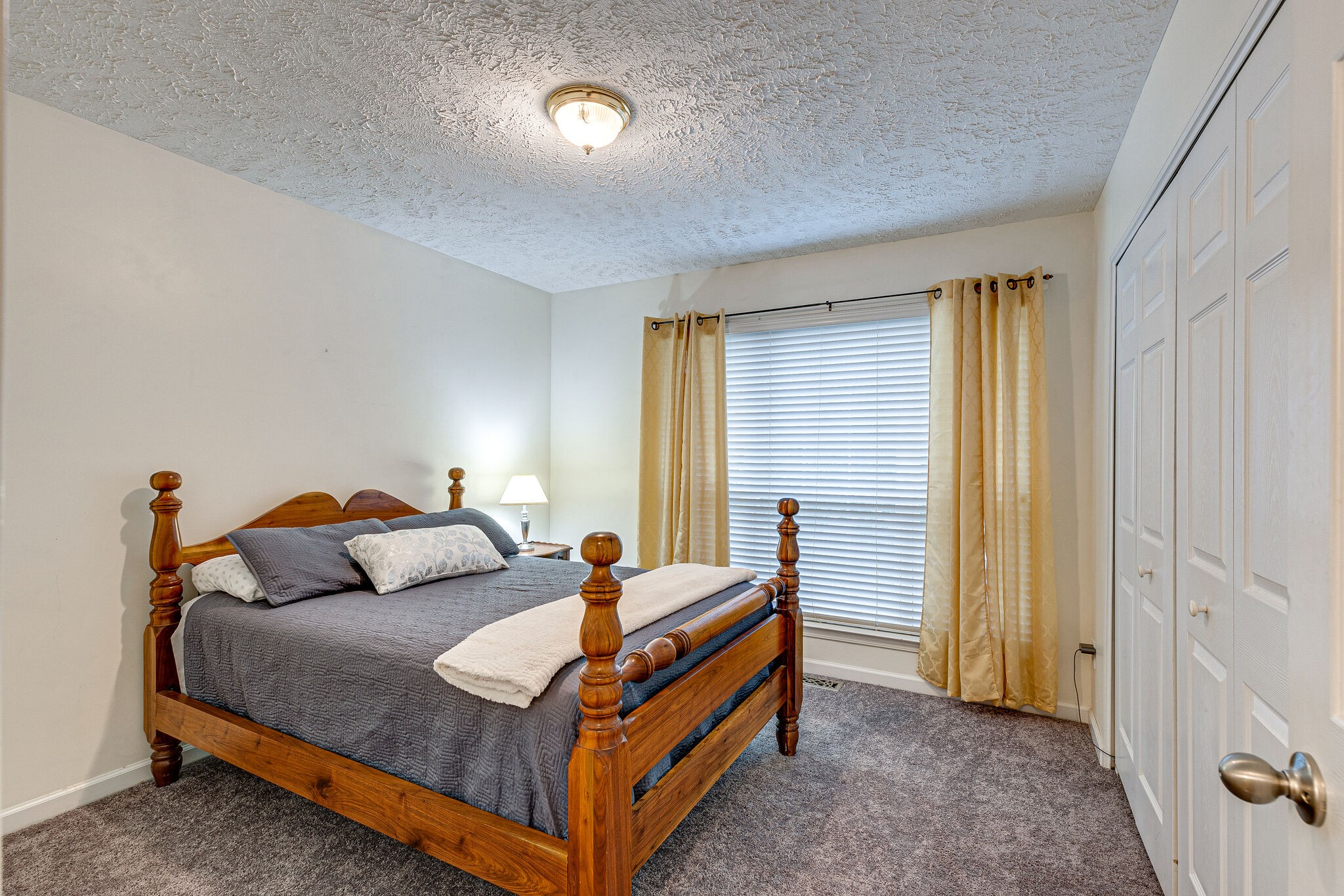 1882 O'Reilly Circle Spring Hill, TN 37174 - Photo 11 of 17 a bedroom with a bed and a window