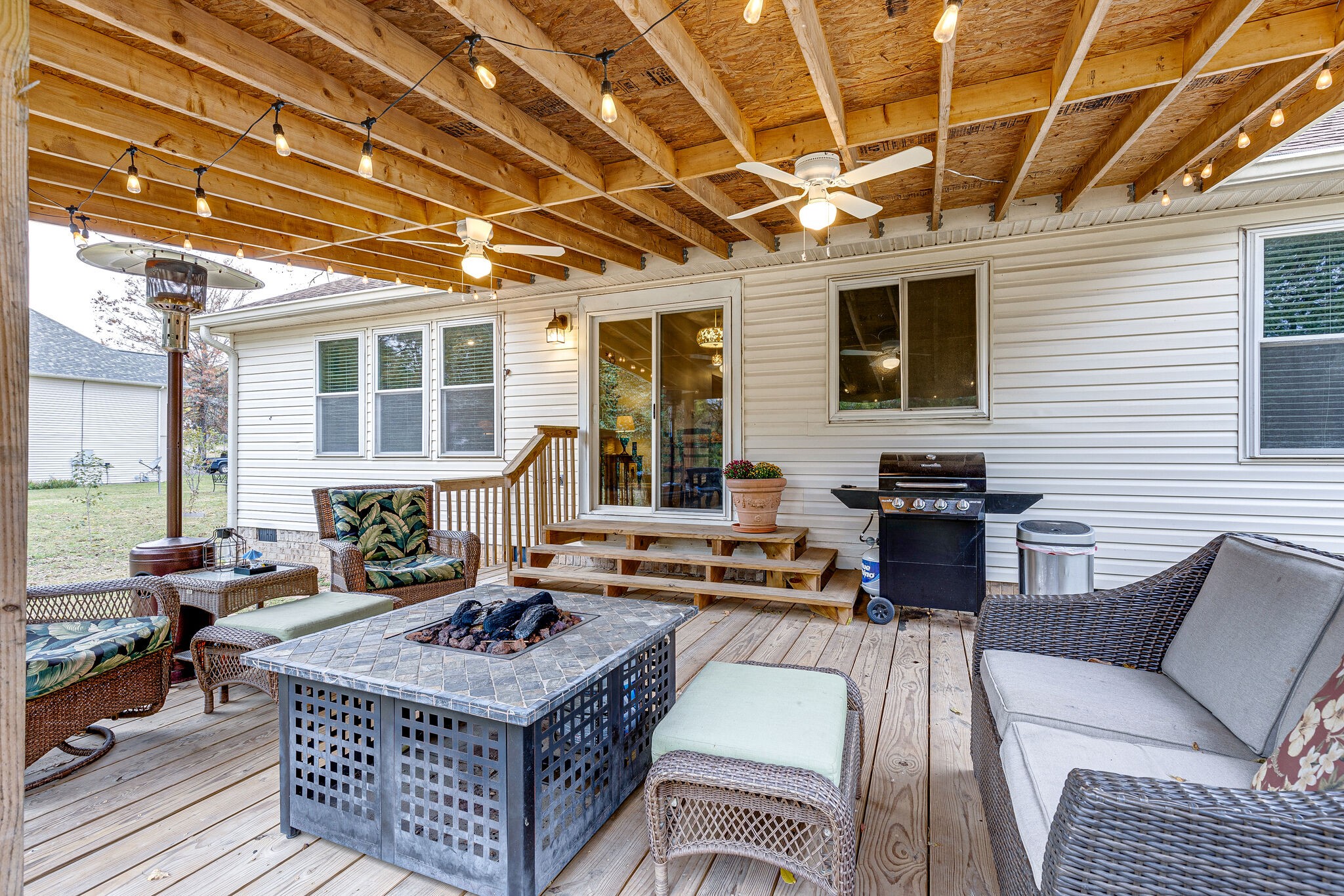 1882 O'Reilly Circle Spring Hill, TN 37174 - Photo 15 of 17 a living room with furniture a fireplace and a table