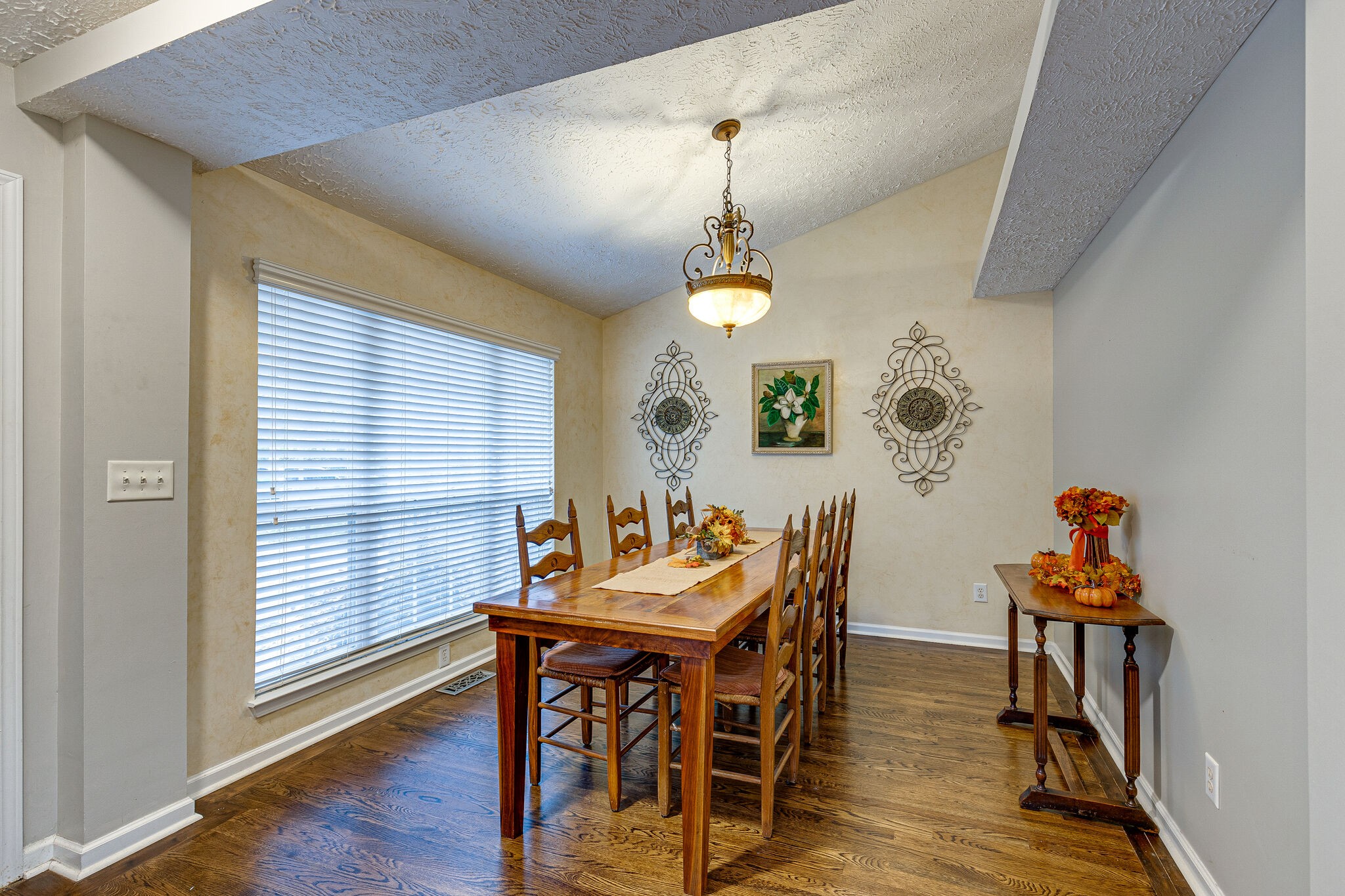 1882 O'Reilly Circle Spring Hill, TN 37174 - Photo 3 of 17 a view of a dining room with furniture and wooden floor