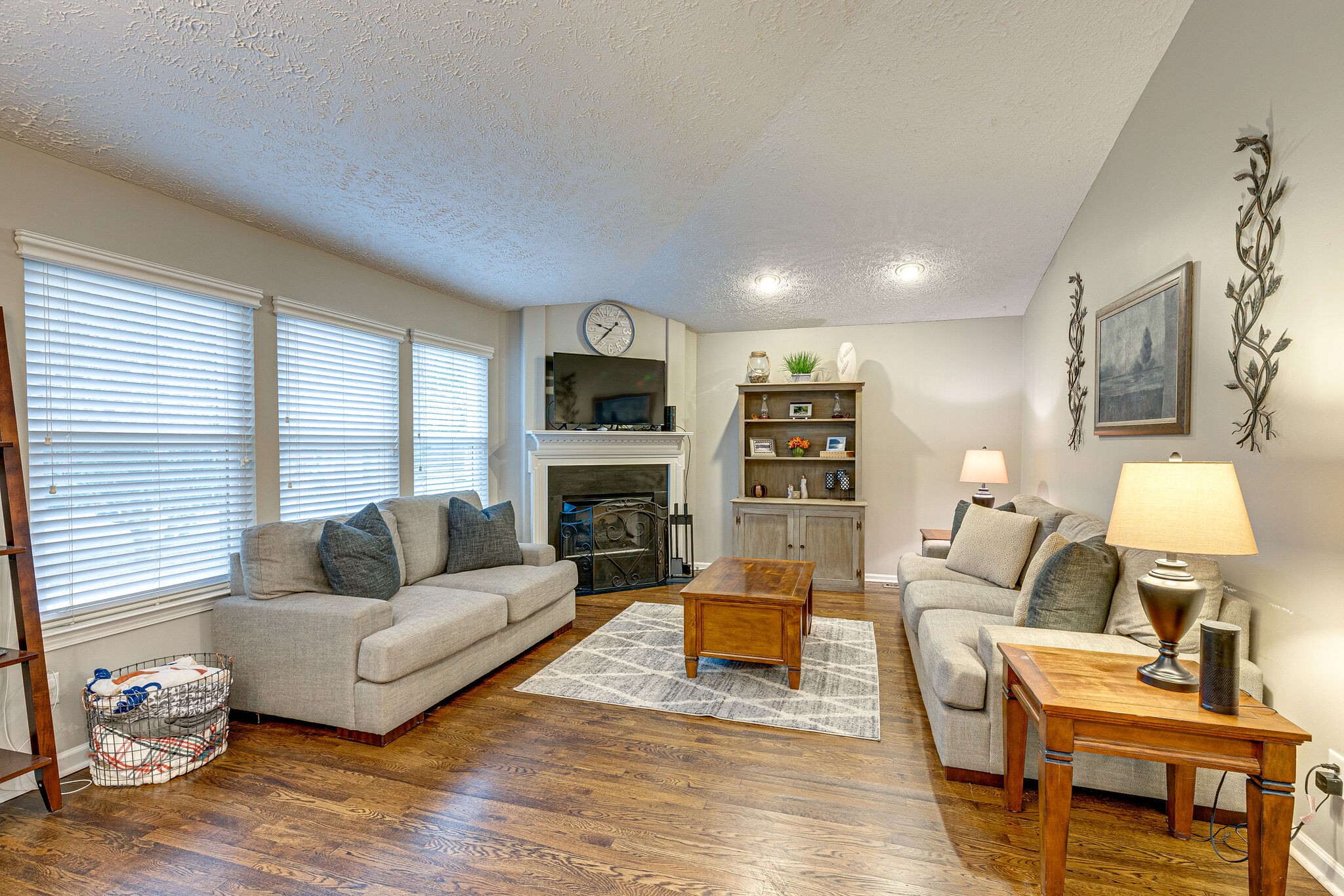 1882 O'Reilly Circle Spring Hill, TN 37174 - Photo 4 of 17 a living room with fireplace furniture and a wooden floor