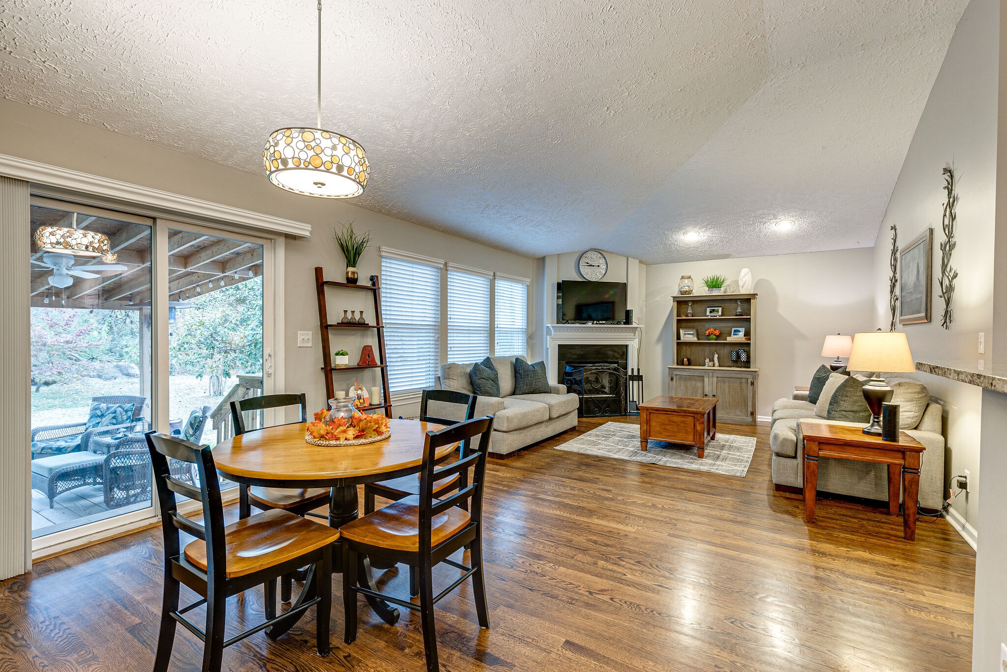 1882 O'Reilly Circle Spring Hill, TN 37174 - Photo 5 of 17 a view of a dining room with furniture a chandelier and wooden floor
