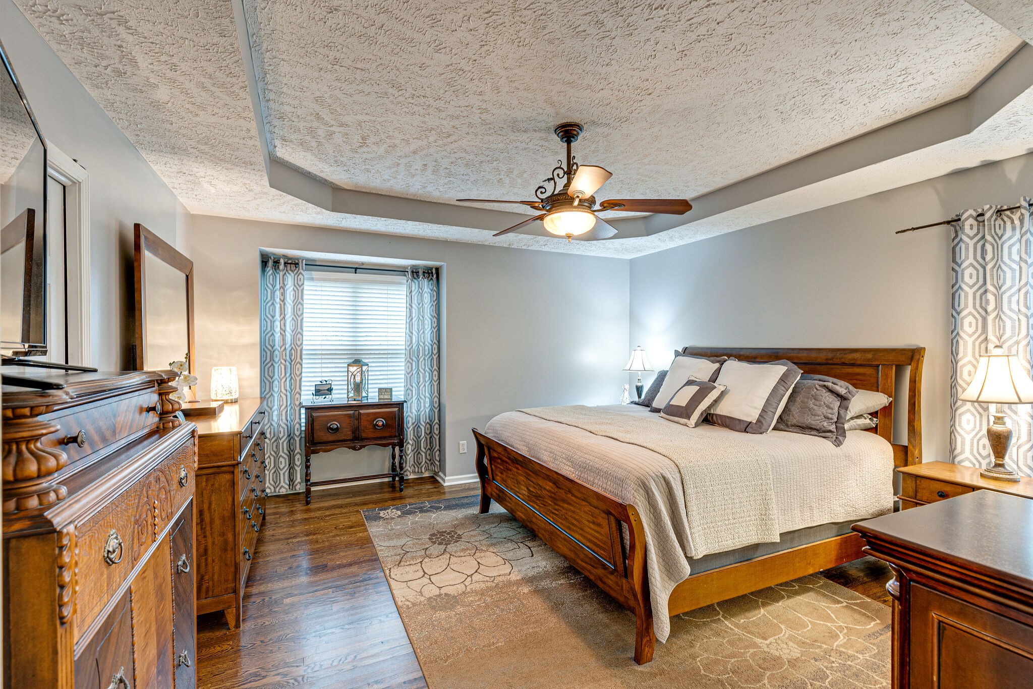 1882 O'Reilly Circle Spring Hill, TN 37174 - Photo 8 of 17 a bedroom with a bed and wooden floor