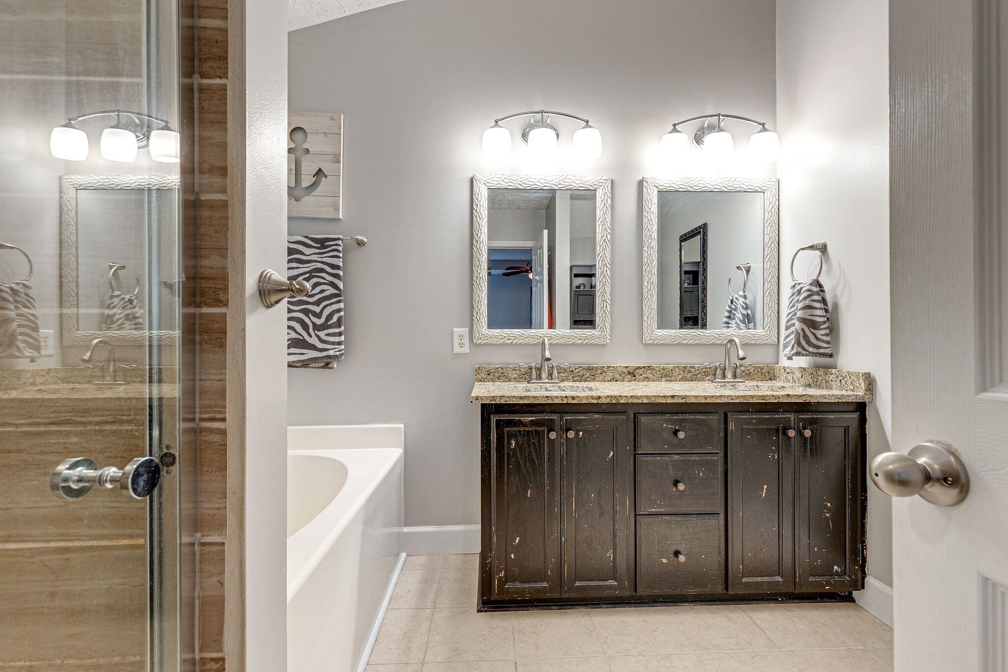 1882 O'Reilly Circle Spring Hill, TN 37174 - Photo 9 of 17 a bathroom with a double vanity sink mirror and shower