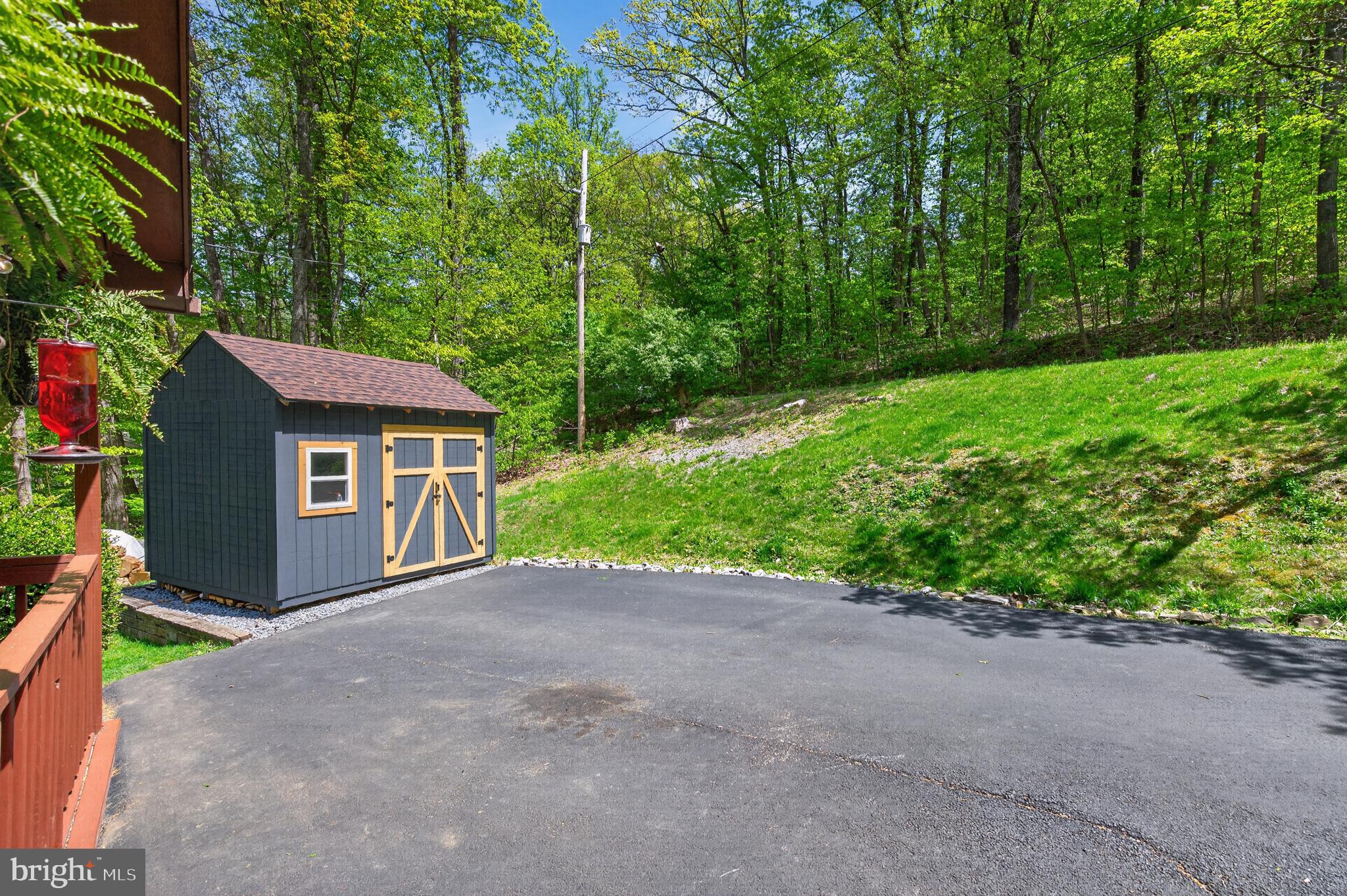 417 Bluebird Way Front Royal, VA 22630 - Photo 8 of 59 Large storage shed and extra wide paved parking