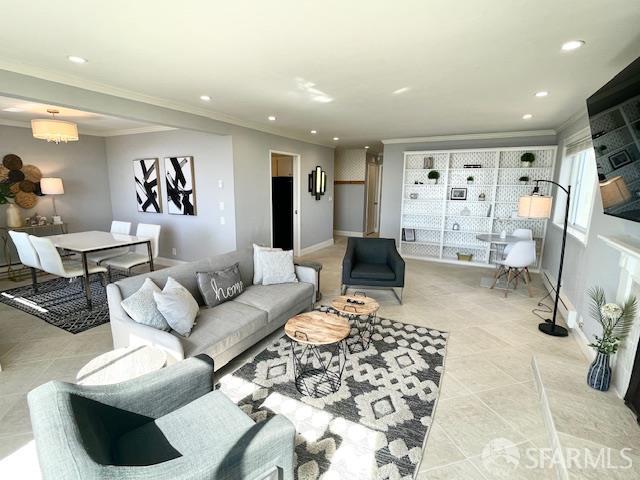 5007 Palmetto Avenue, Unit 37 Pacifica, CA 94044 - Photo 1 of 9 a living room with furniture and a flat screen tv