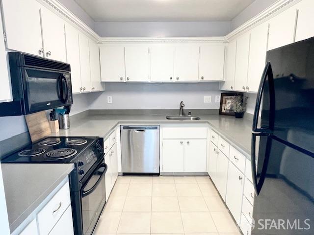 5007 Palmetto Avenue, Unit 37 Pacifica, CA 94044 - Photo 5 of 9 a kitchen with stainless steel appliances granite countertop a stove microwave and sink