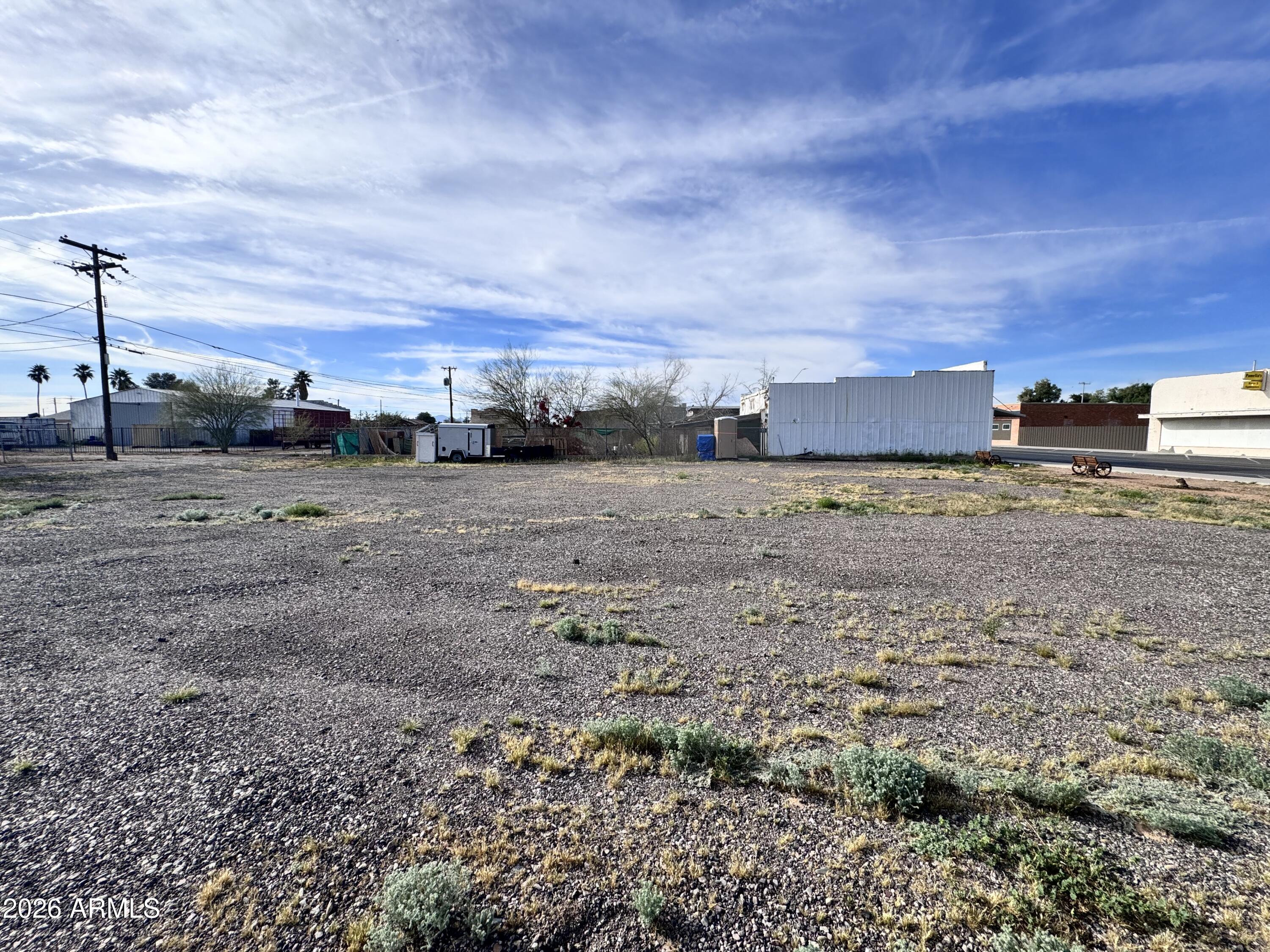 321 South Main Street, Unit 2 Coolidge, AZ 85128 - Photo 13 of 15 a view of a dry yard with a road
