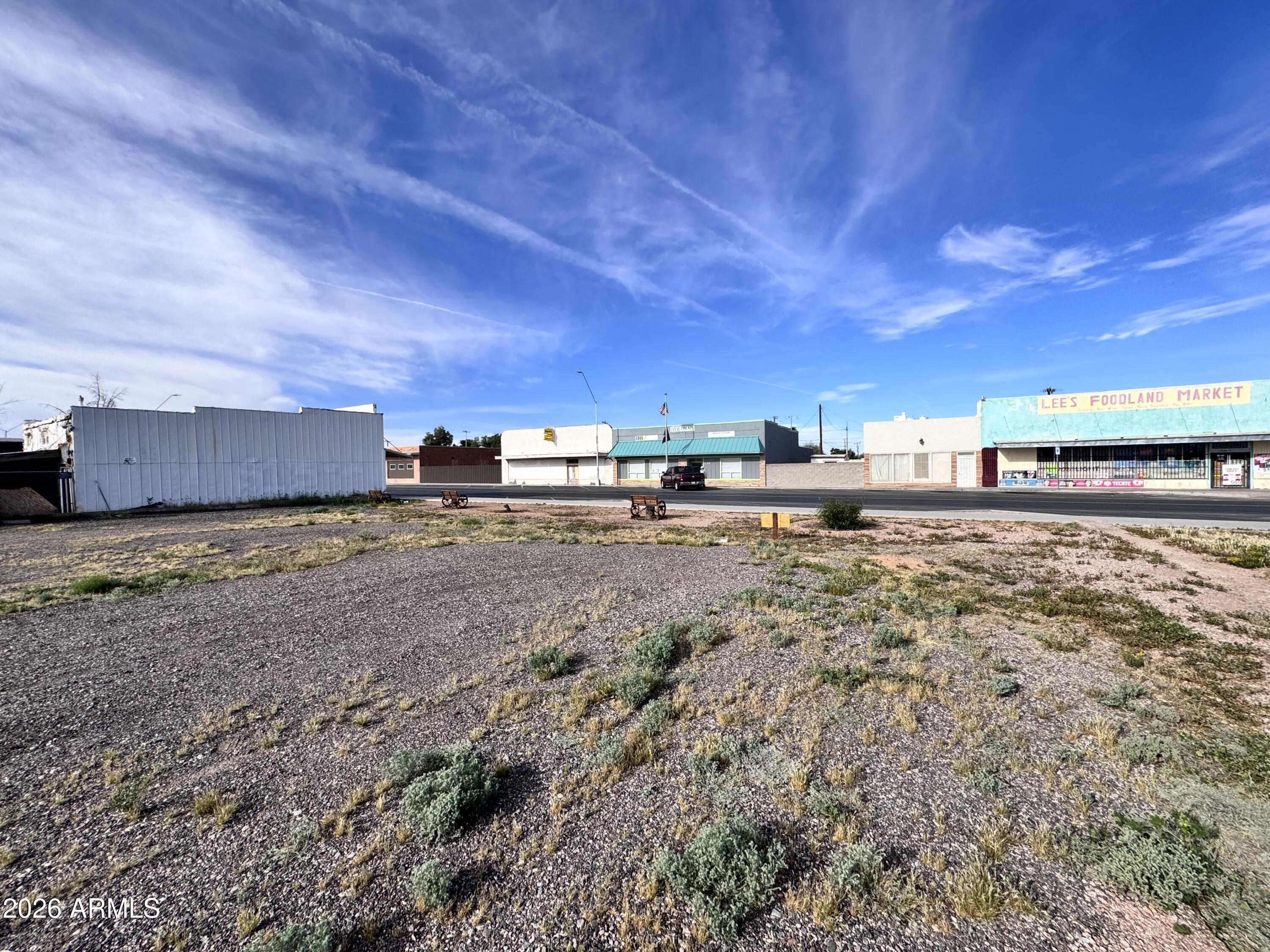 321 South Main Street, Unit 2 Coolidge, AZ 85128 - Photo 14 of 15 a view of a big yard with wooden fence