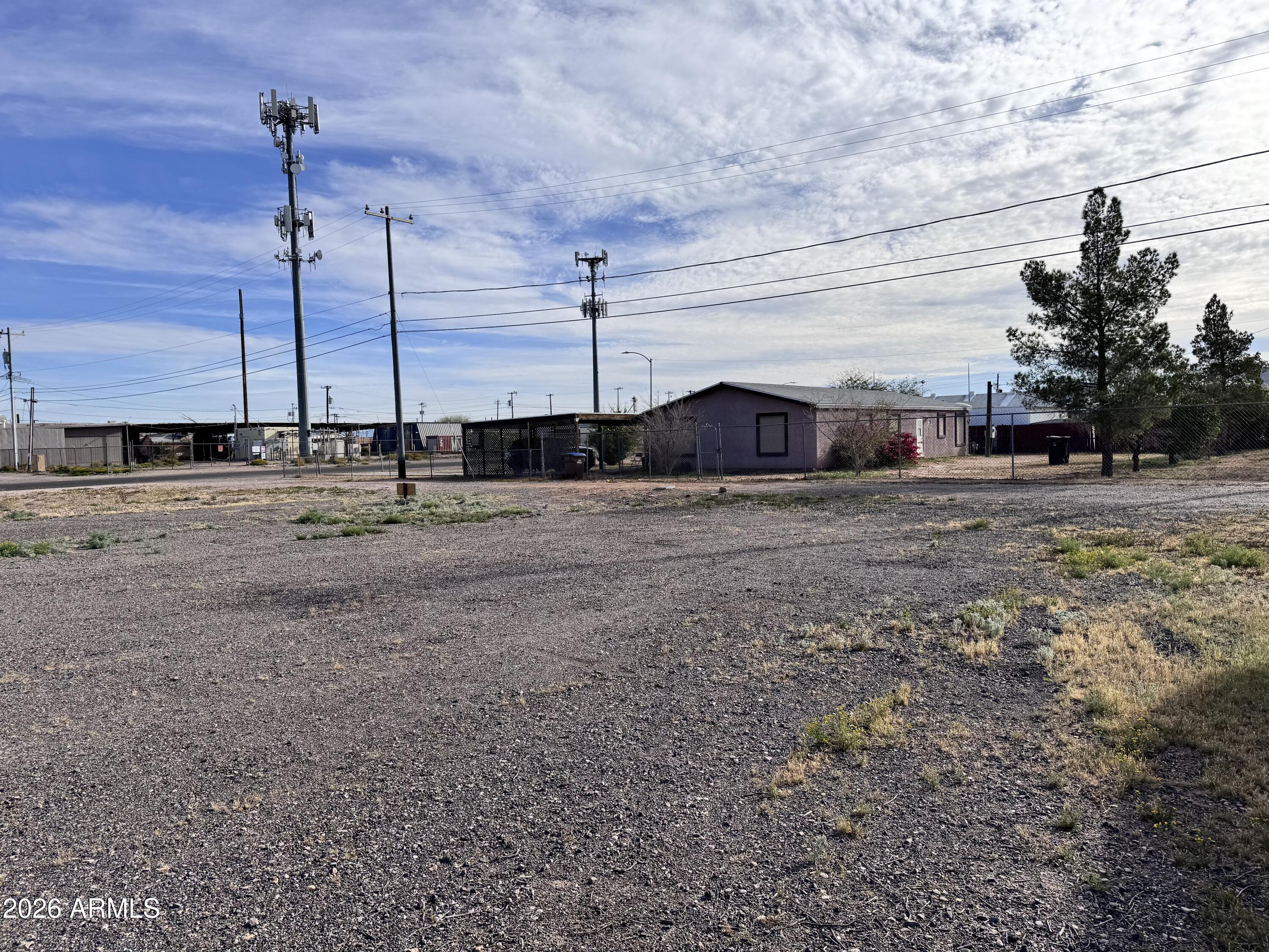 321 South Main Street, Unit 2 Coolidge, AZ 85128 - Photo 9 of 15 a view of a house with a backyard