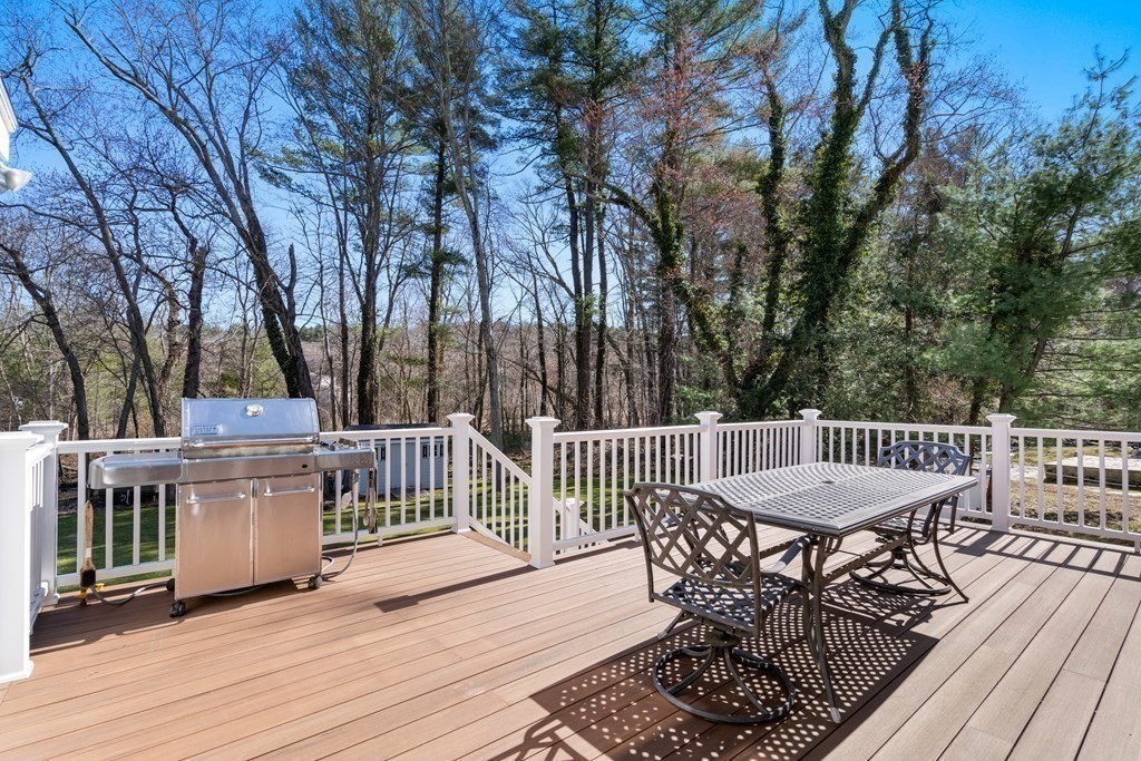 48 Brook Road Weston, MA 02493 - Photo 29 of 32 a view of a chairs and table on the wooden floor